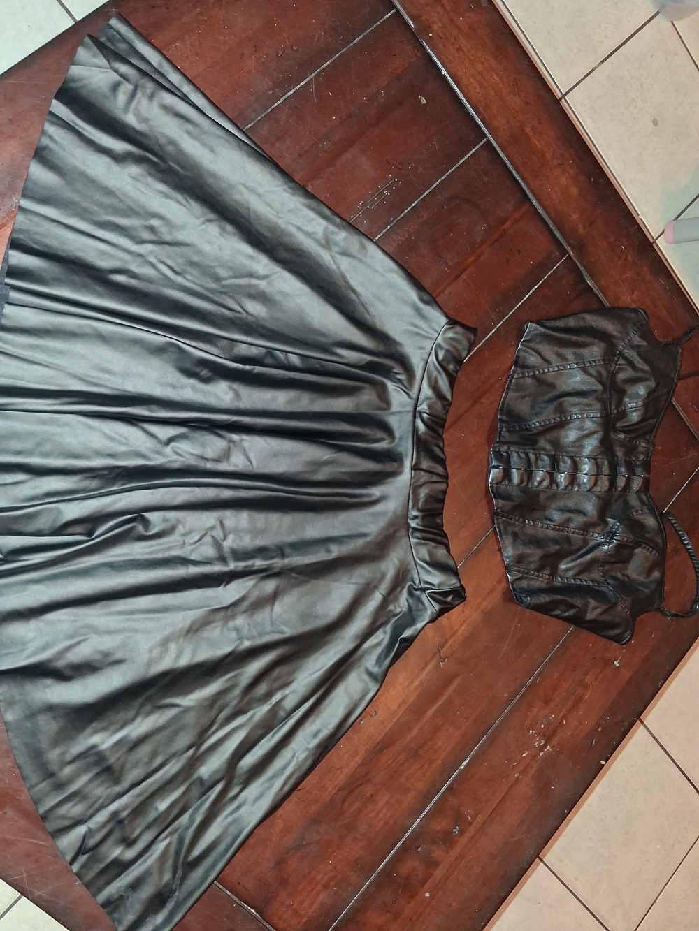 Rainbow Black Faux Leather Garment with Red Brand Tag
